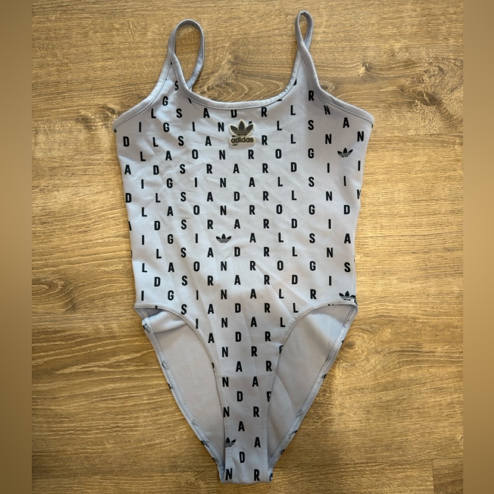 Adidas Light Blue Apparel with Signature Logo